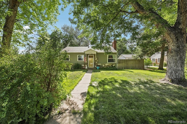 1975 Cody St, Lakewood, CO 80215 - bungalow featuring a chimney