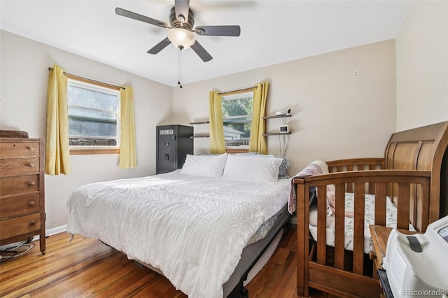 1975 Cody St, Lakewood, CO 80215 - bedroom with wood finished floors and ceiling fan