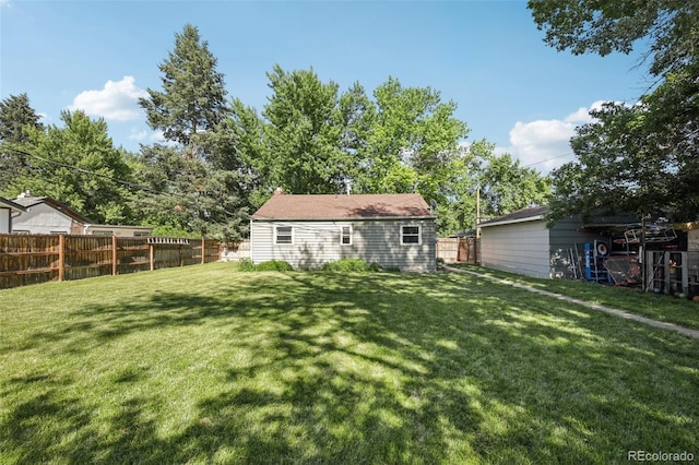 1975 Cody St, Lakewood, CO 80215 - back of house featuring a fenced backyard