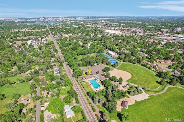 1975 Cody St, Lakewood, CO 80215 - aerial view of property and surrounding area with a tree filled landscape
