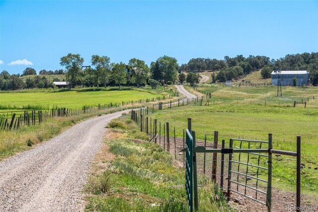 view of road featuring a rural view