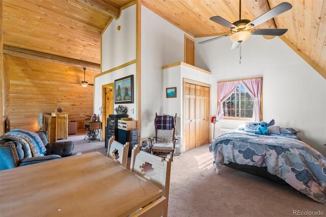 carpeted bedroom featuring wood ceiling, high vaulted ceiling, wood walls, and ceiling fan