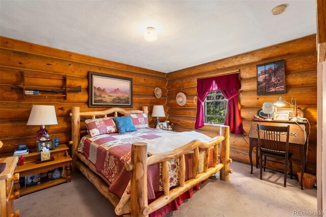 carpeted bedroom featuring rustic walls