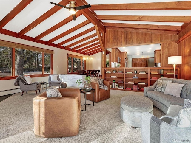 living room featuring lofted ceiling with beams, ceiling fan with notable chandelier, carpet floors, and wood walls