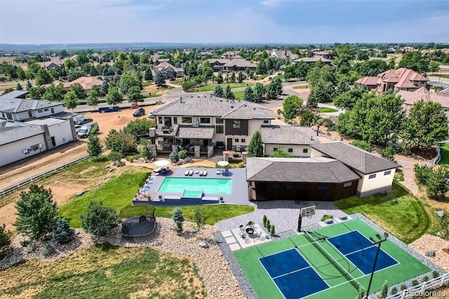 birds eye view of property with a residential view