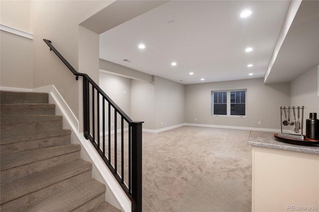 interior space with light colored carpet