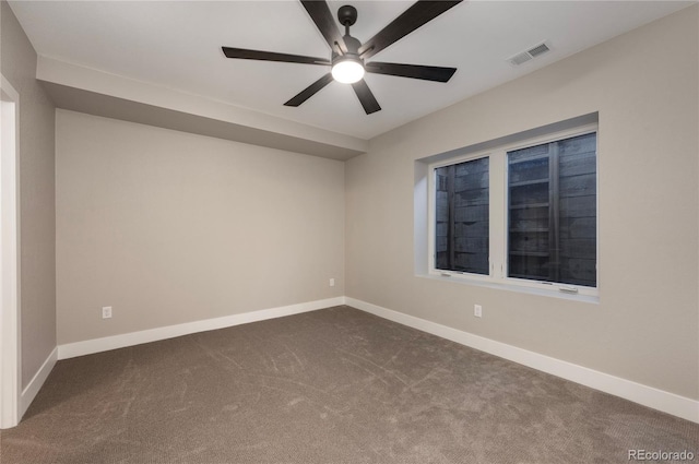 carpeted empty room with ceiling fan