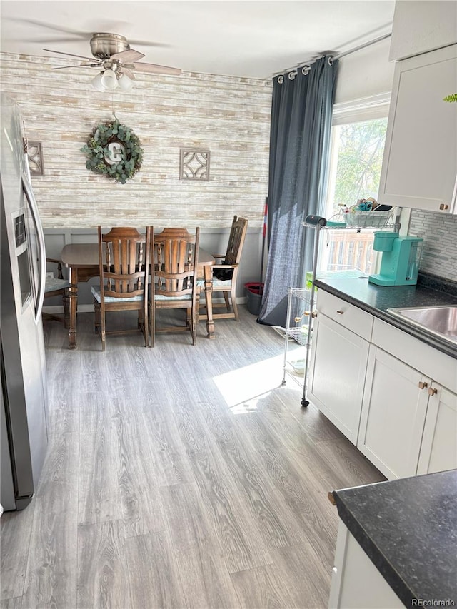 428 Prospect Ave, La Junta, CO 81050 - dining area with ceiling fan and wood finished floors