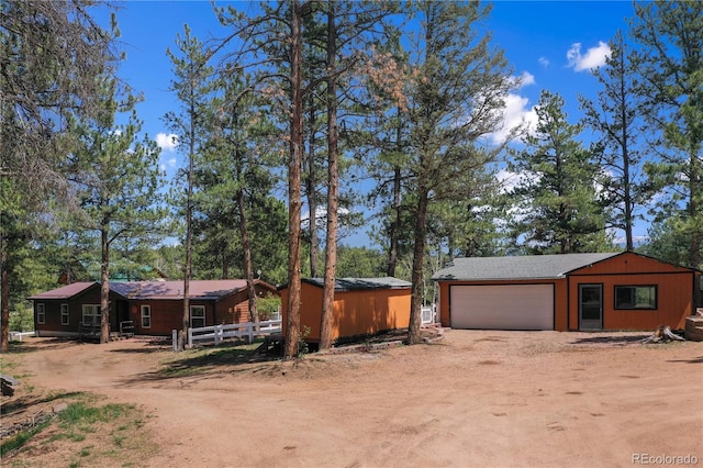 840 Obsidian Dr, Florissant, CO 80816 - view of front of home featuring driveway and a garage