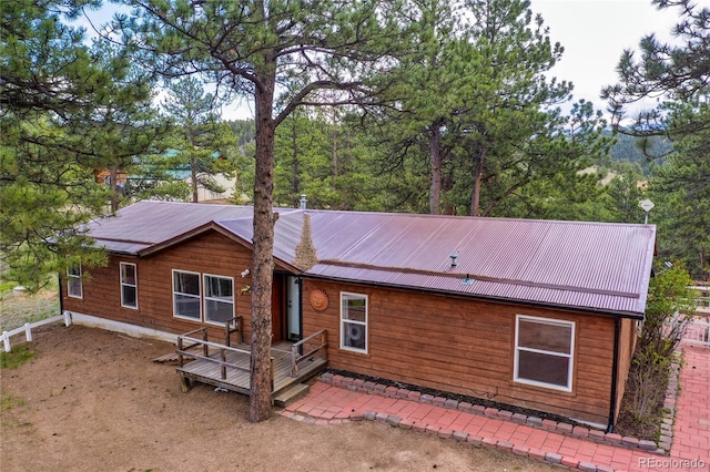 840 Obsidian Dr, Florissant, CO 80816 - back of property with metal roof