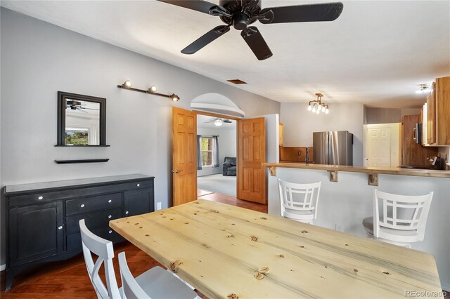 840 Obsidian Dr, Florissant, CO 80816 - dining room with ceiling fan, dark wood-style flooring, and lofted ceiling