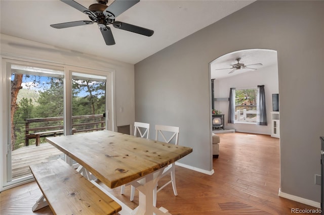 840 Obsidian Dr, Florissant, CO 80816 - dining space with lofted ceiling, a ceiling fan, light wood-style flooring, and baseboards