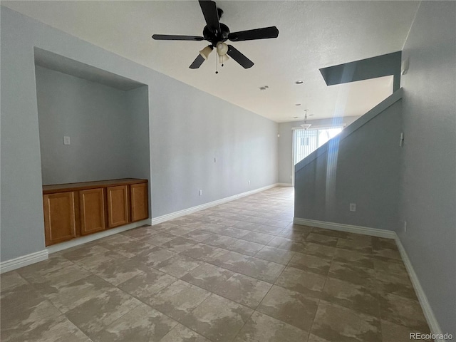 5537 Malta St, Denver, CO 80249 - spare room featuring a ceiling fan and baseboards
