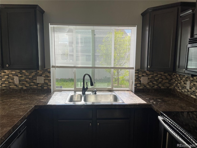 5537 Malta St, Denver, CO 80249 - kitchen with a sink, tasteful backsplash, and healthy amount of natural light