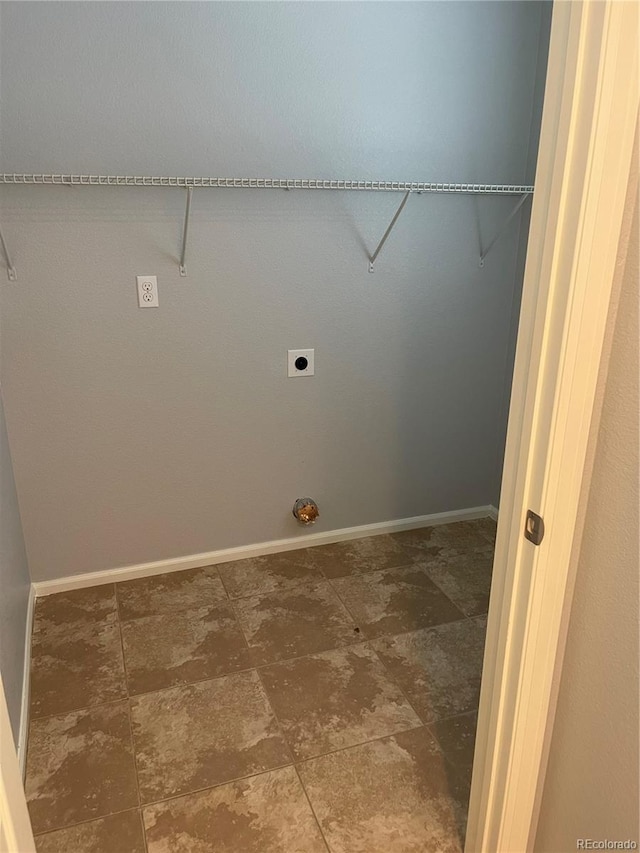 5537 Malta St, Denver, CO 80249 - laundry room with hookup for an electric dryer and baseboards