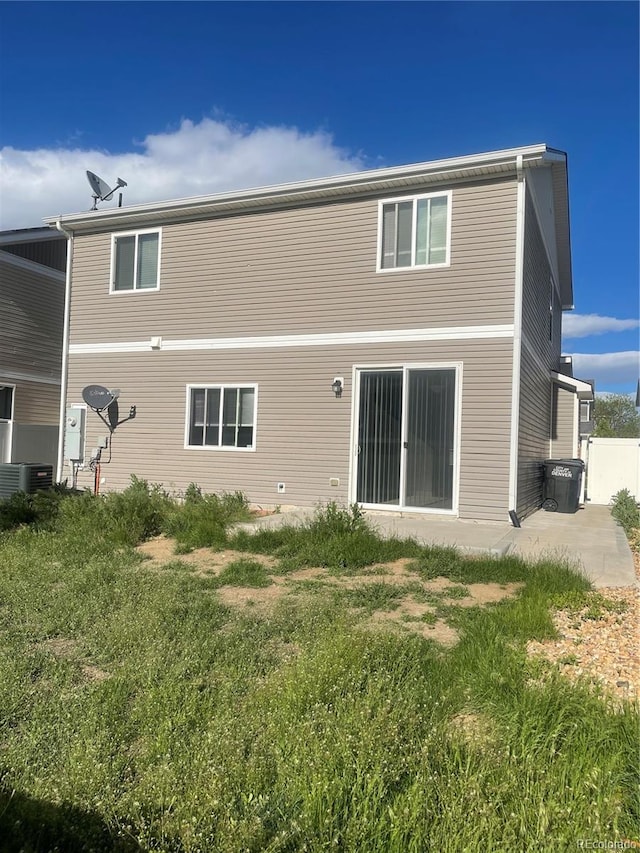 5537 Malta St, Denver, CO 80249 - back of house featuring cooling unit