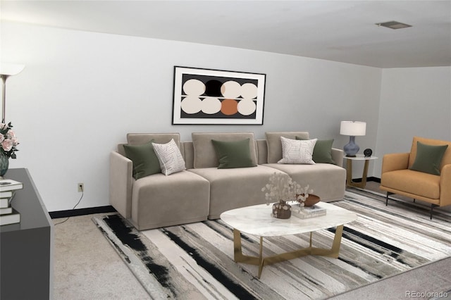 living area featuring light carpet, baseboards, and visible vents