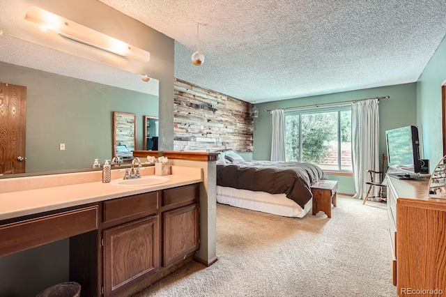 4162 S Dunkirk Way, Aurora, CO 80013 - bedroom with light carpet, a textured ceiling, and wooden walls