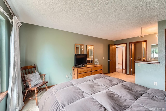 4162 S Dunkirk Way, Aurora, CO 80013 - bedroom with light colored carpet and a textured ceiling