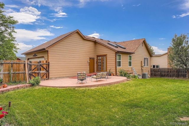 4162 S Dunkirk Way, Aurora, CO 80013 - rear view of house with a patio area and a fenced backyard