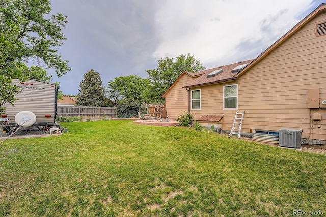 4162 S Dunkirk Way, Aurora, CO 80013 - view of yard featuring a patio area