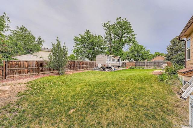4162 S Dunkirk Way, Aurora, CO 80013 - fenced backyard featuring an outbuilding