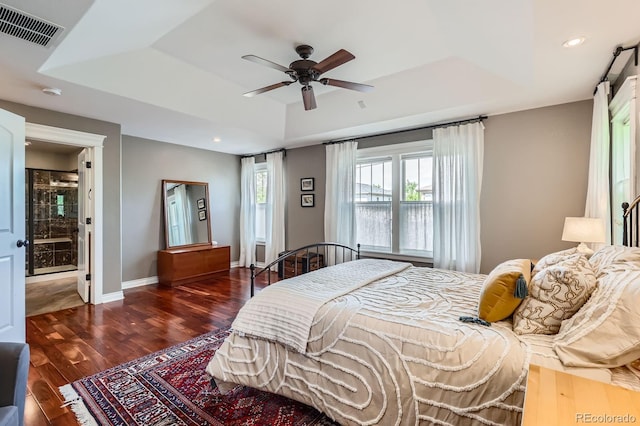 3386 Beeler Ct, Denver, CO 80238 - bedroom with a tray ceiling, wood finished floors, baseboards, recessed lighting, and a ceiling fan