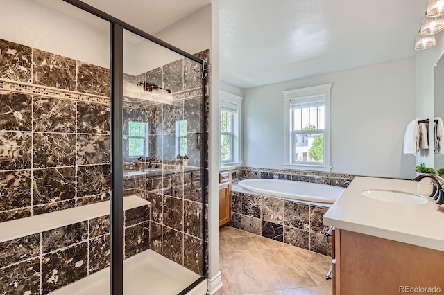 3386 Beeler Ct, Denver, CO 80238 - bathroom featuring a shower stall, a garden tub, and vanity