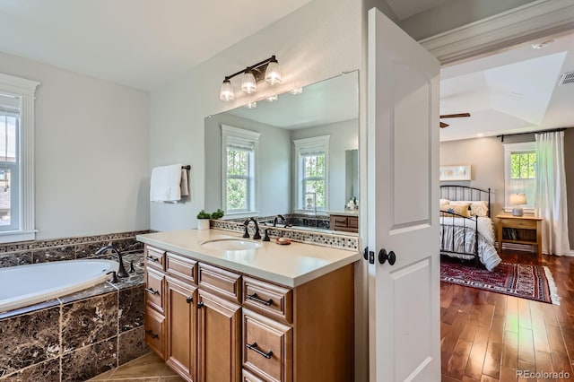 3386 Beeler Ct, Denver, CO 80238 - full bath with ensuite bathroom, plenty of natural light, a bath, and vanity