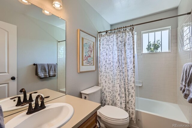 3386 Beeler Ct, Denver, CO 80238 - bathroom with toilet, vanity, and shower / tub combo with curtain