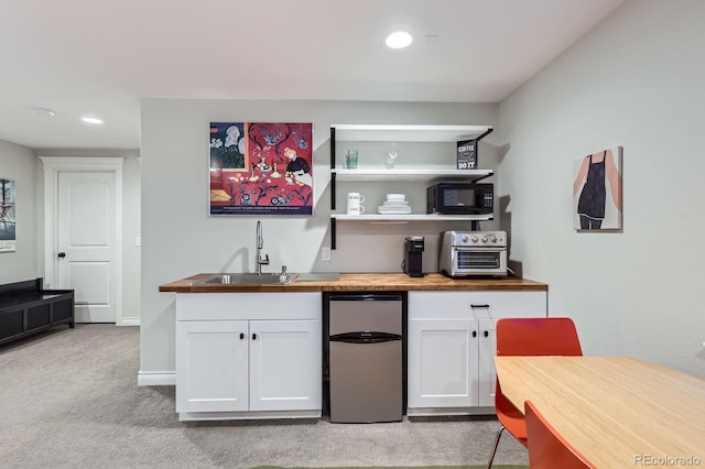 3386 Beeler Ct, Denver, CO 80238 - bar area featuring a sink, light carpet, black microwave, fridge, and recessed lighting