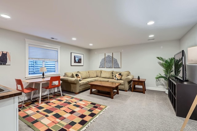 3386 Beeler Ct, Denver, CO 80238 - living room featuring light carpet, recessed lighting, and baseboards