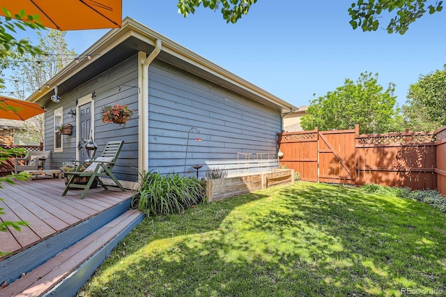 3386 Beeler Ct, Denver, CO 80238 - view of side of property featuring a gate and a wooden deck