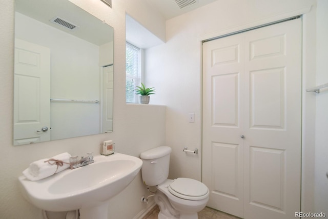 bathroom with sink and toilet