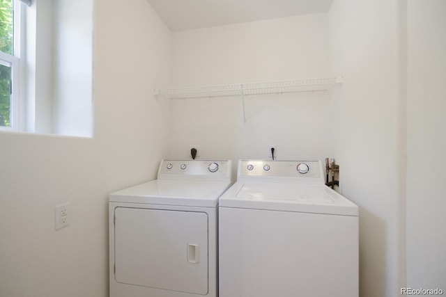 laundry room with independent washer and dryer