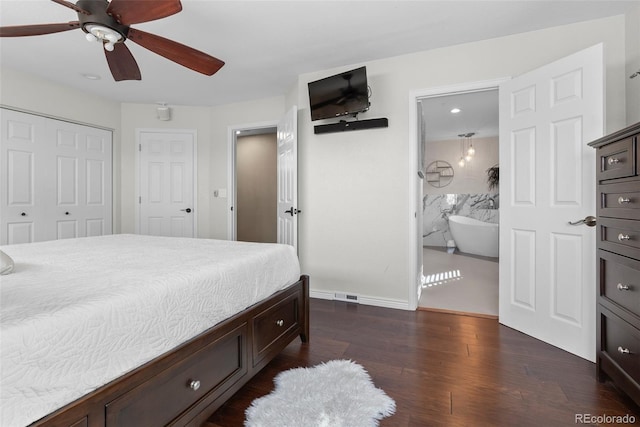 bedroom featuring ceiling fan, dark hardwood / wood-style floors, and ensuite bath