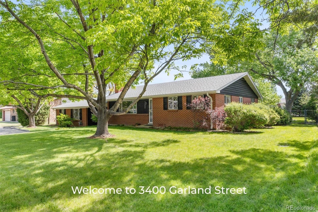 3400 Garland St, Wheat Ridge, CO 80033 - ranch-style house with brick siding