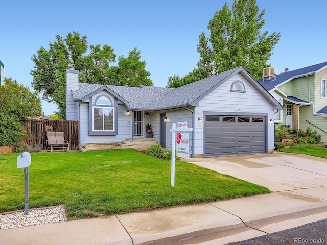 12646 Osceola St, Broomfield, CO 80020 - view of front of home featuring a garage, a chimney, concrete driveway, and roof with shingles