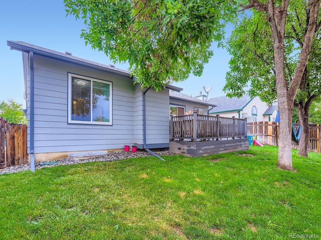 12646 Osceola St, Broomfield, CO 80020 - back of property with a deck and a fenced backyard