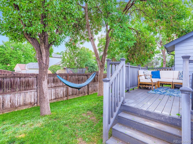 12646 Osceola St, Broomfield, CO 80020 - wooden terrace featuring a fenced backyard and outdoor lounge area