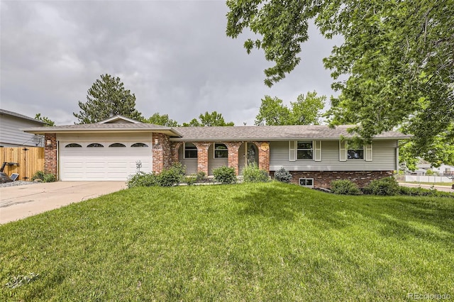7746 S Gray St, Littleton, CO 80128 - single story home with an attached garage, brick siding, and concrete driveway