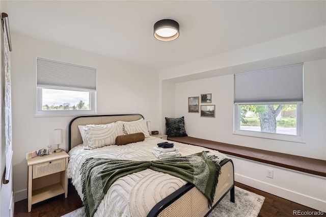 7746 S Gray St, Littleton, CO 80128 - bedroom featuring baseboards and dark wood-style floors