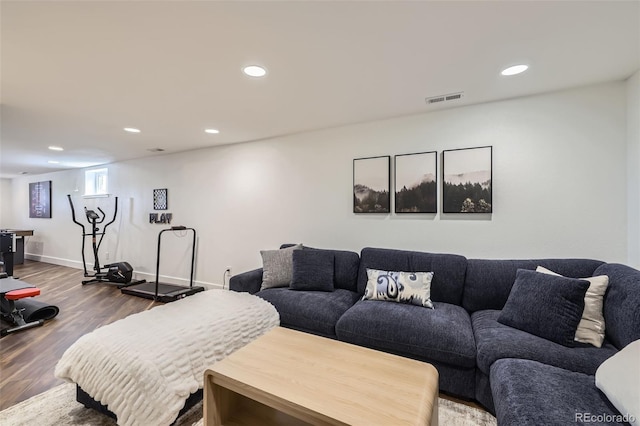 7746 S Gray St, Littleton, CO 80128 - living room with wood finished floors, recessed lighting, and baseboards