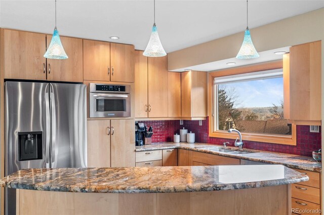 3620 Silver Plume Ln, Boulder, CO 80305 - kitchen with stainless steel appliances, a sink, light brown cabinets, dark stone countertops, and backsplash