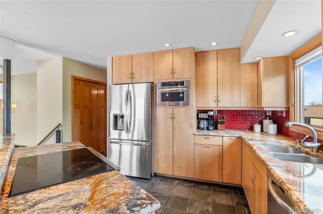 3620 Silver Plume Ln, Boulder, CO 80305 - kitchen featuring stainless steel appliances, a sink, light stone counters, decorative backsplash, and recessed lighting