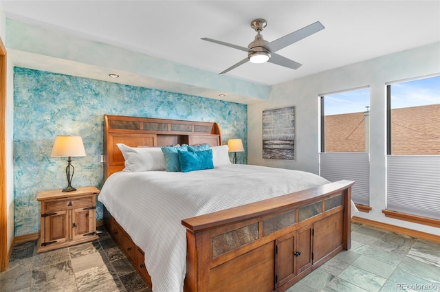 3620 Silver Plume Ln, Boulder, CO 80305 - bedroom with stone tile flooring, wallpapered walls, baseboards, and ceiling fan