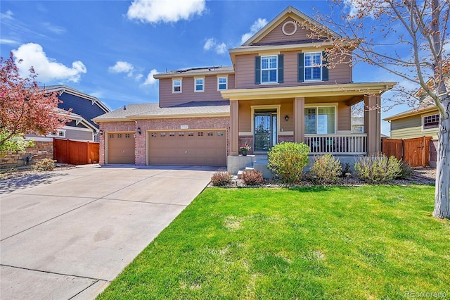 view of front of house featuring a porch, driveway, fence, a front lawn, and an attached garage