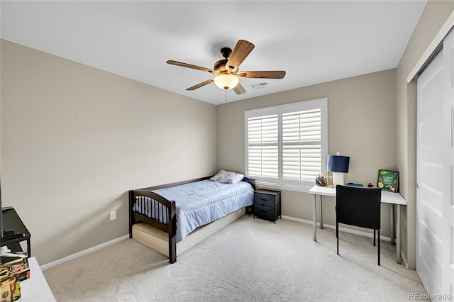 bedroom featuring baseboards, carpet flooring, and ceiling fan