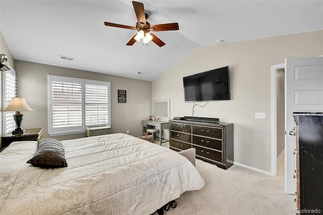 bedroom with visible vents, lofted ceiling, baseboards, ceiling fan, and carpet