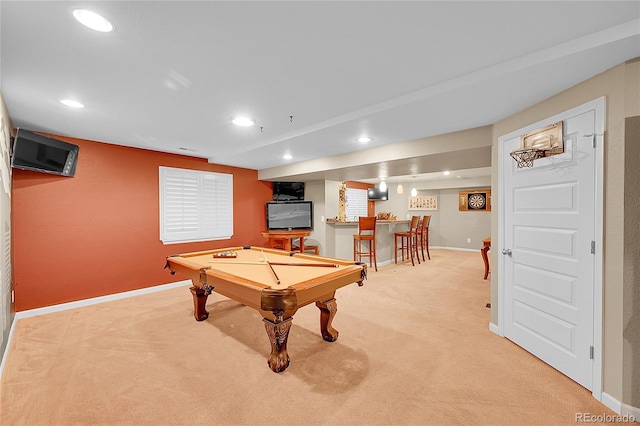 rec room featuring light colored carpet, billiards, bar, and baseboards